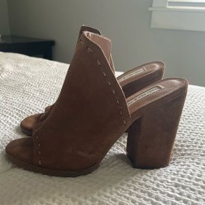 Brown Chelsea and violet heels